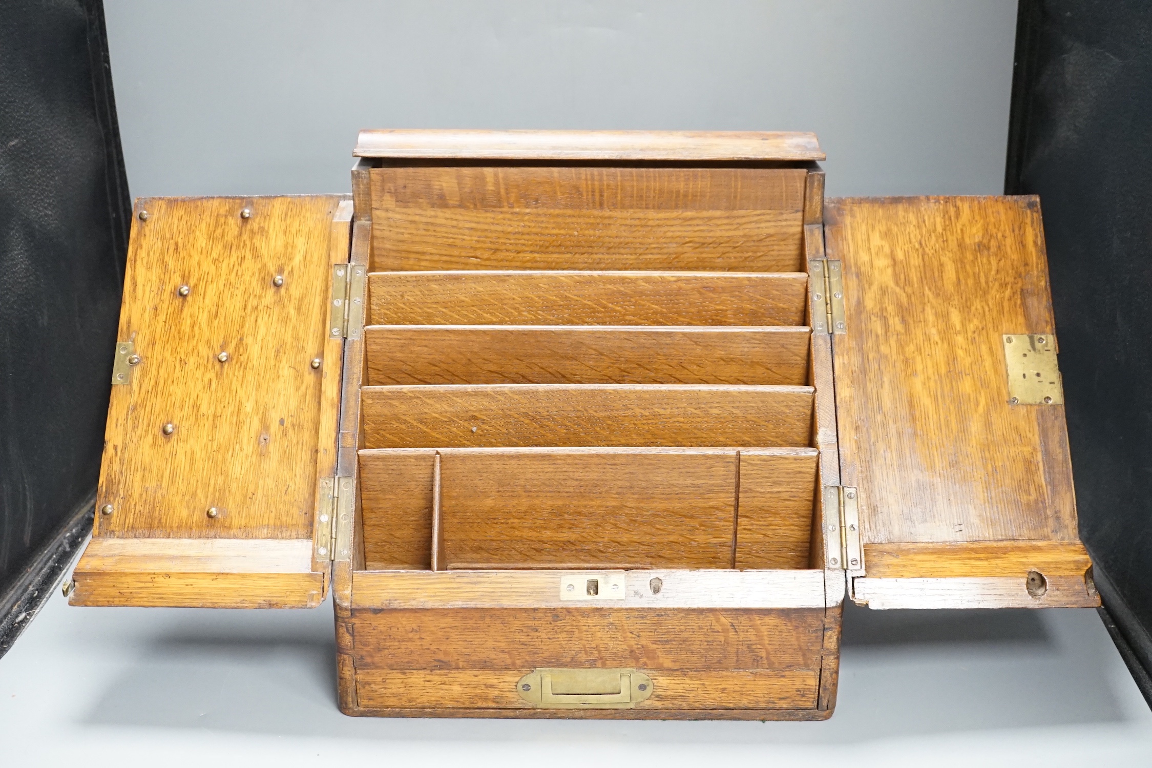 A Victorian oak stationery box with original fittings
